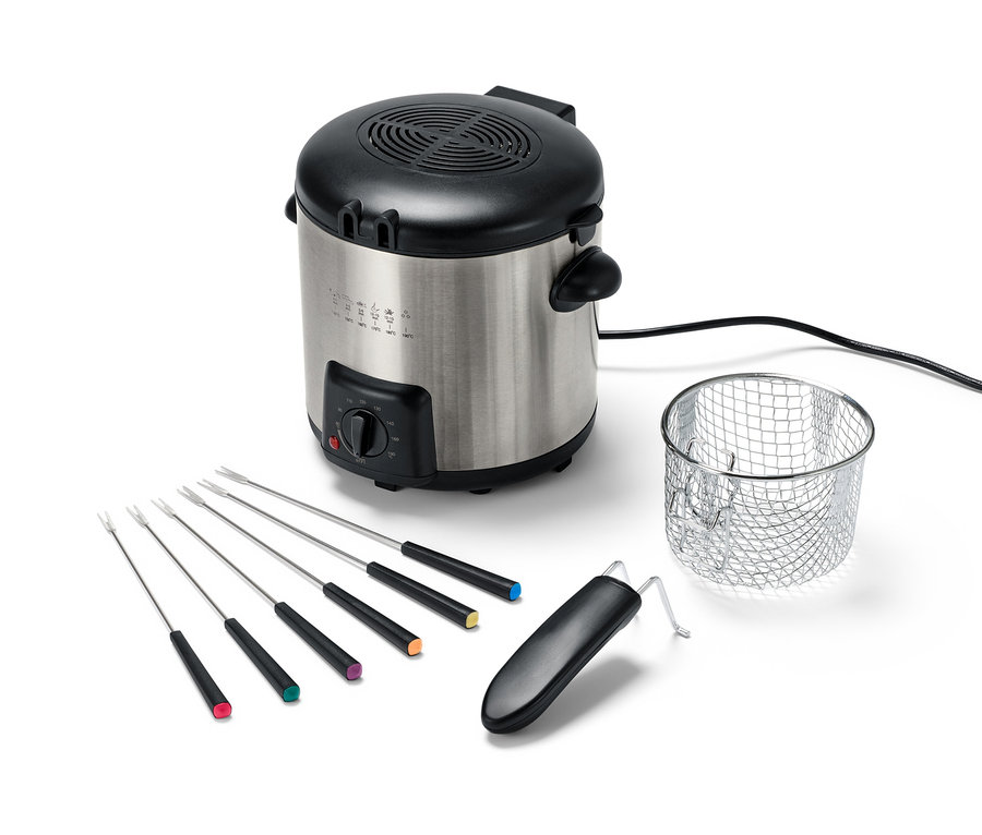 Mini friteuse et appareil à fondue avec six fourchettes colorées et panier.