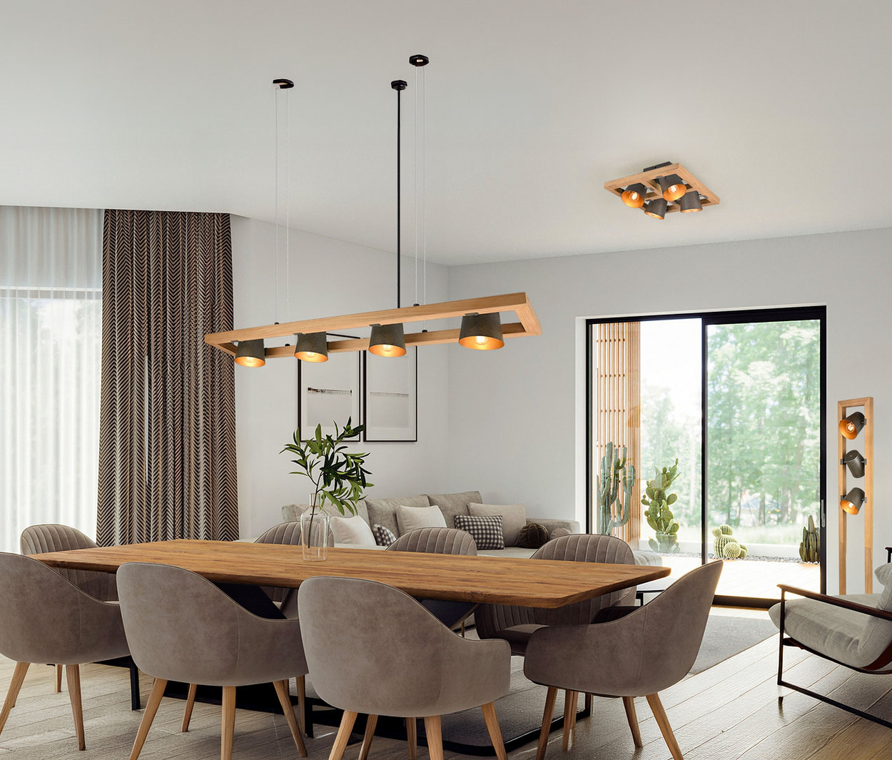 Table à manger avec six chaises sous la suspension Trio «
Bell
», 4 ampoules. Une autre suspension Trio est installée au plafond.