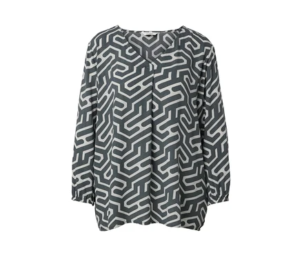 Blouse grise à motif géométrique blanc aspect froissé.