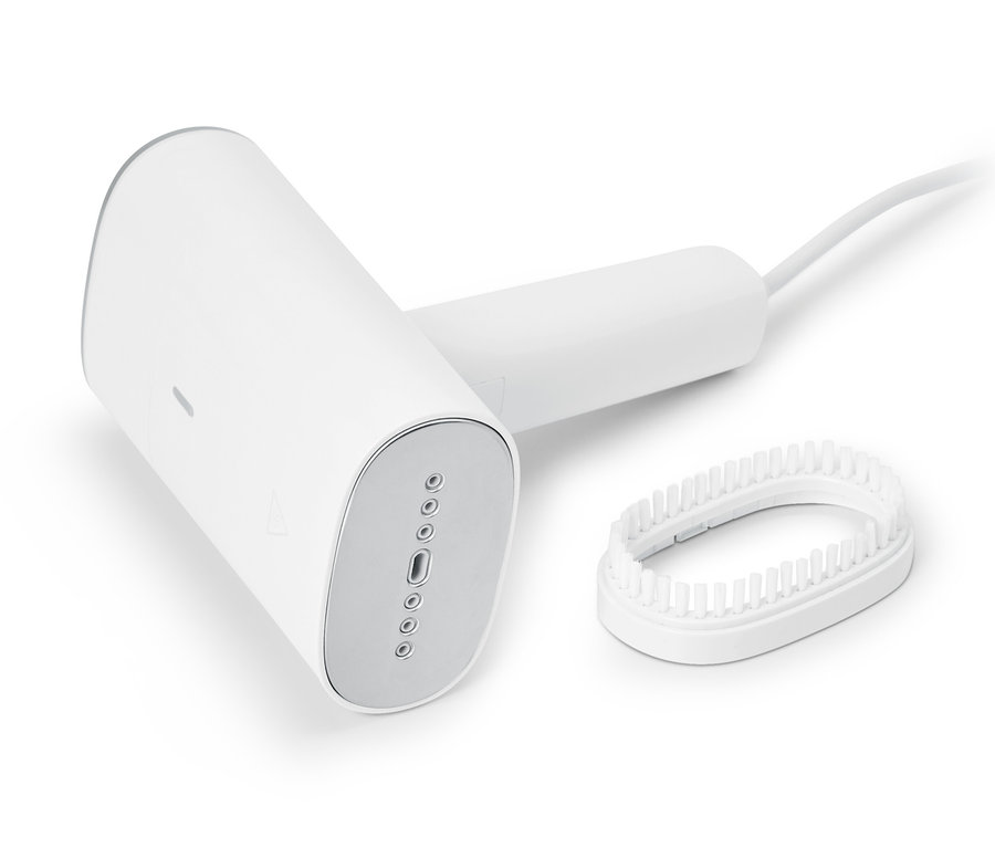Brosse à vapeur blanche avec accessoire.