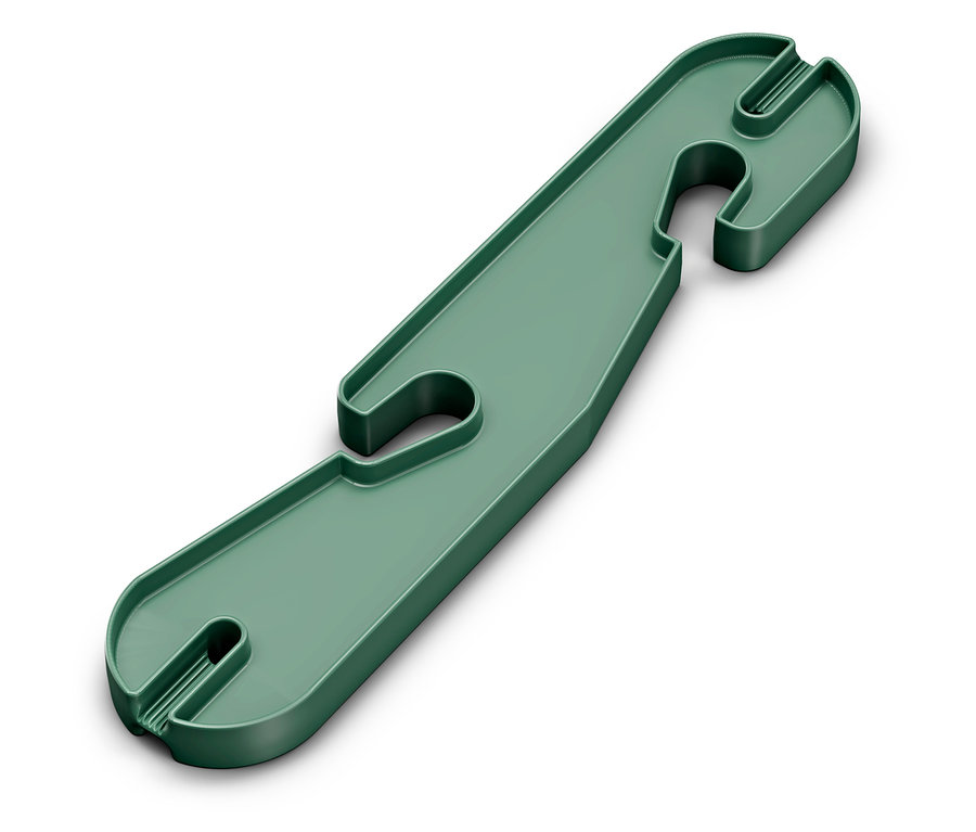 Attache-câble en plastique vert avec des ouvertures.