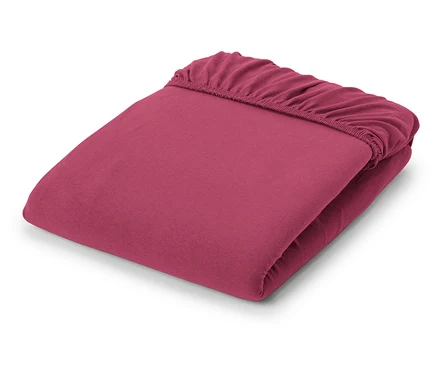 Drap-housse en jersey plié, couleur baie.
