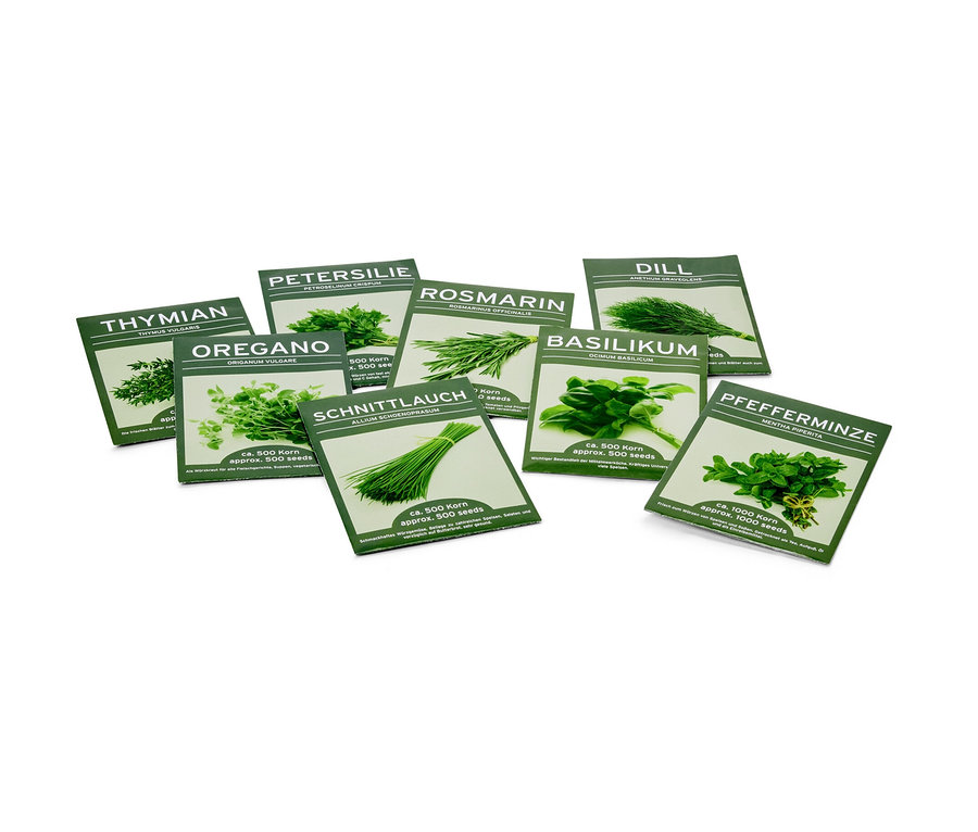 L'image présente des paquets de graines de 8 herbes aromatiques classiques, notamment du thym, de l'origan, du persil, du romarin, de la ciboulette, de l'aneth, du basilic et de la menthe poivrée.