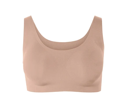 Soutien-gorge de sport couleur pêche.