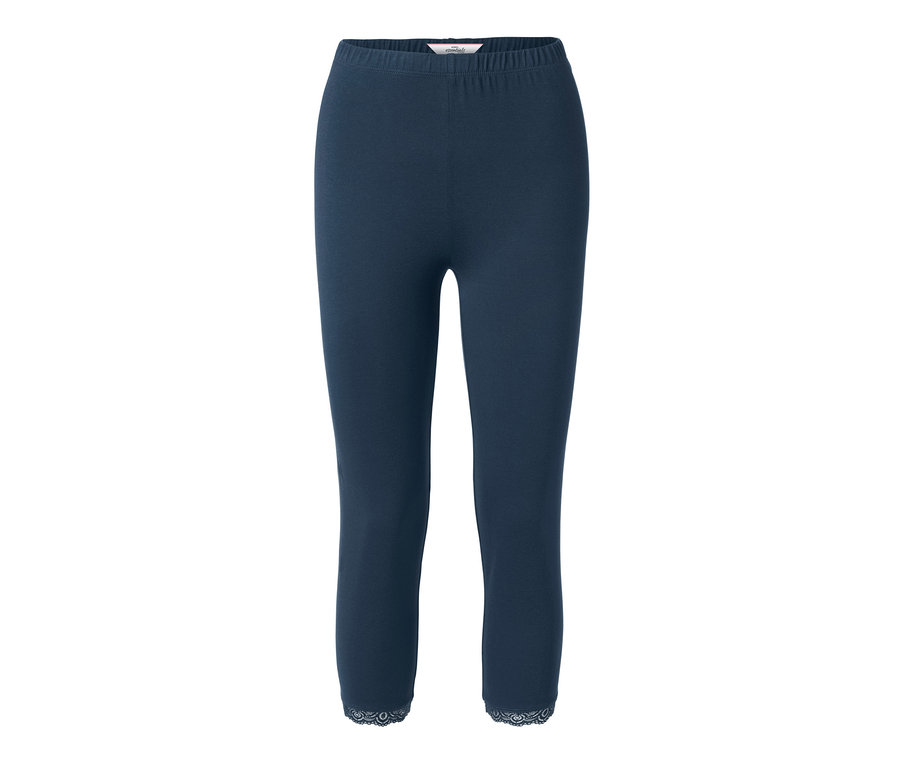 Legging court bleu foncé avec bord en dentelle.