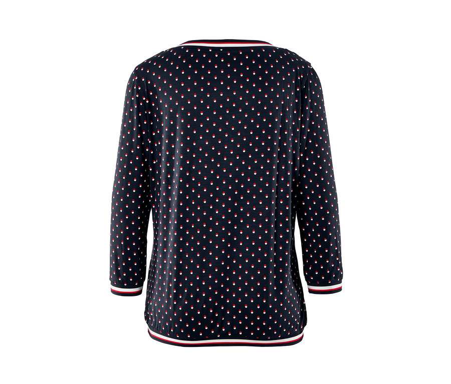 Blouse manches 3/4 avec un fond bleu marine et des pois rouges et blancs.