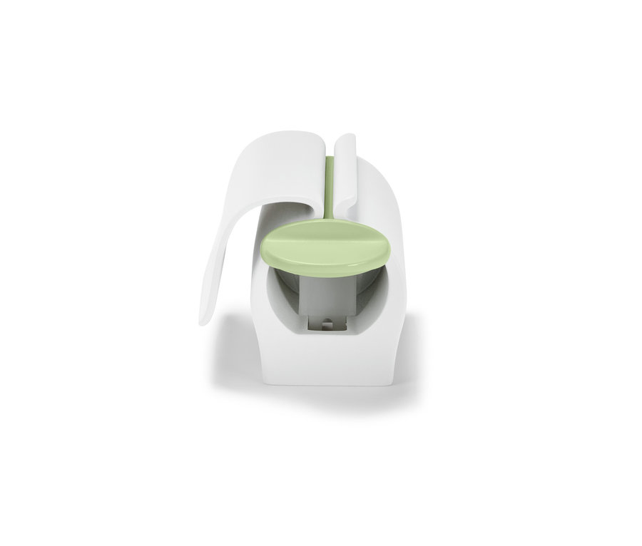 Presse-tube blanc avec clip pour le réfrigérateur.