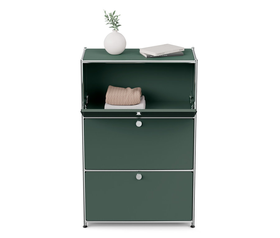 Commode en métal « CN3 » à 3 abattants, vase et livre sur le dessus.