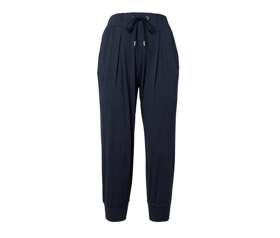 Un pantalon 3/4 en jersey bleu foncé sur fond blanc.