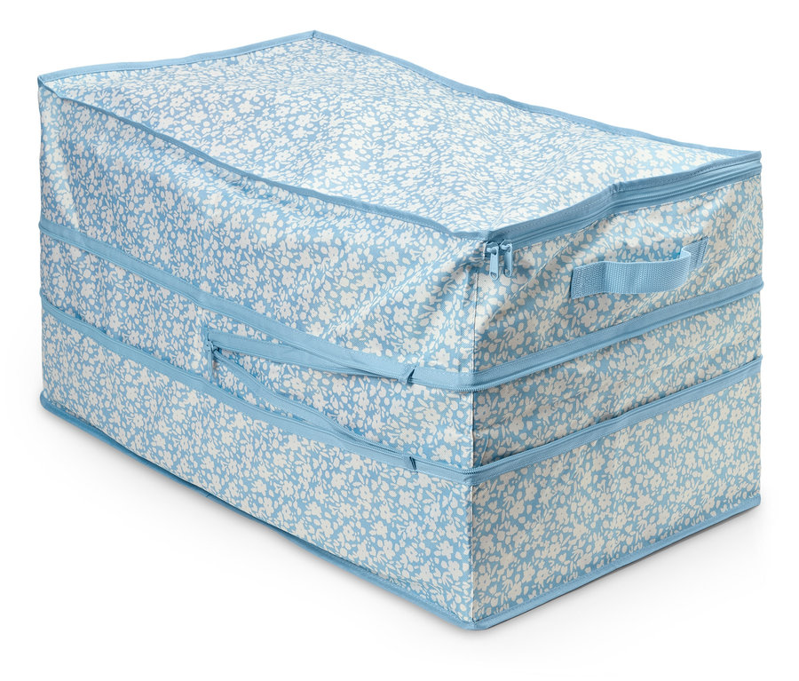 Grand sac de rangement à motif floral bleu et blanc avec fermeture éclair.
