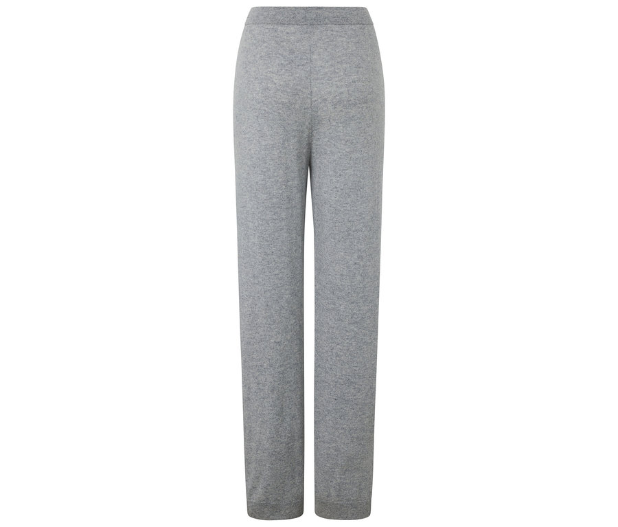 Un pantalon de yoga gris en maille, présenté sur un fond blanc.