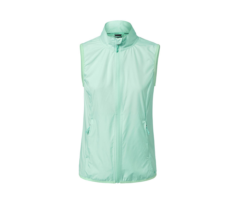 Un gilet de sport de couleur menthe sur un fond blanc.