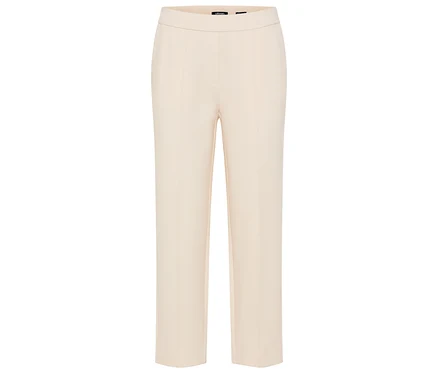 Pantalon long beige en tissu sur fond blanc.