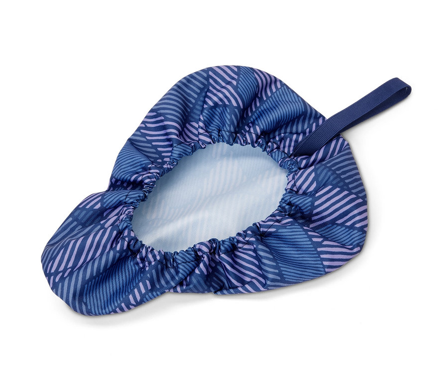 Housse de selle de vélo bleue à motif géométrique.