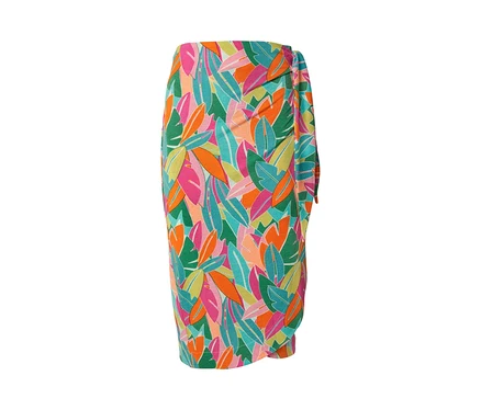 Gros plan sur une jupe portefeuille en jersey avec un motif de feuilles colorées.