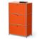 Armoire orange à trois étages avec un livre sur le dessus.