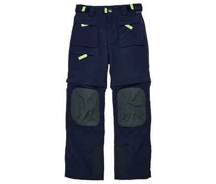 Pantalon zip-off JAKO-O marine avec poches et détails néon.
