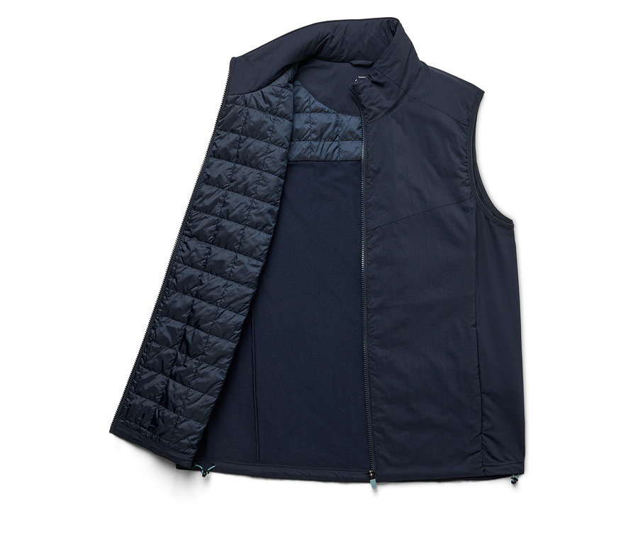 Gilet bleu marine ouvert avec fermeture éclair.