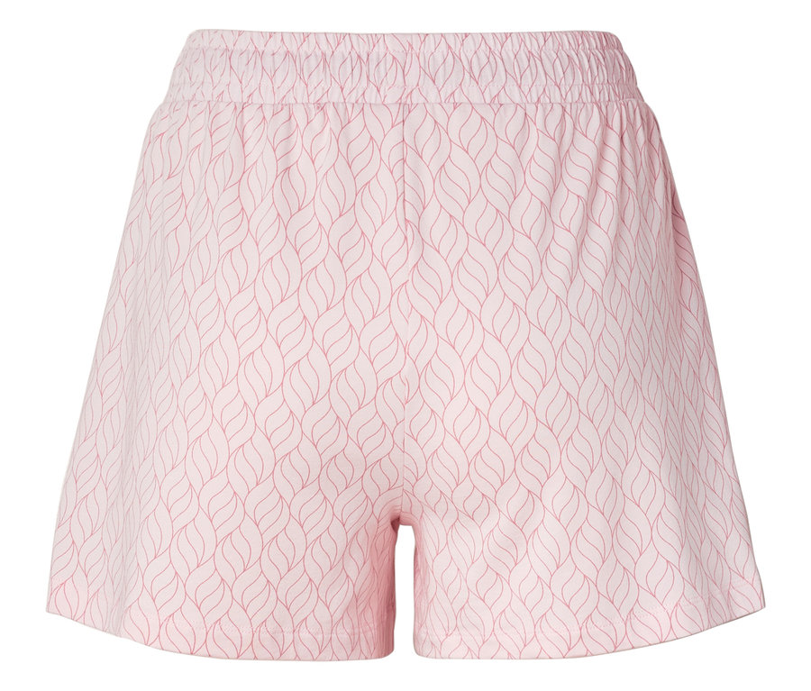 Gros plan d'un short court rose clair avec un motif de feuilles et une taille élastique.