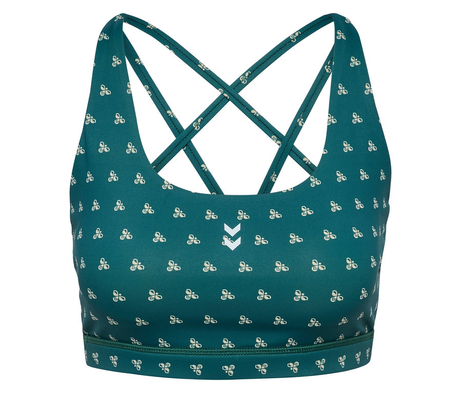 Gros plan d'un soutien-gorge de sport HUMMEL vert avec motif blanc et bretelles croisées.