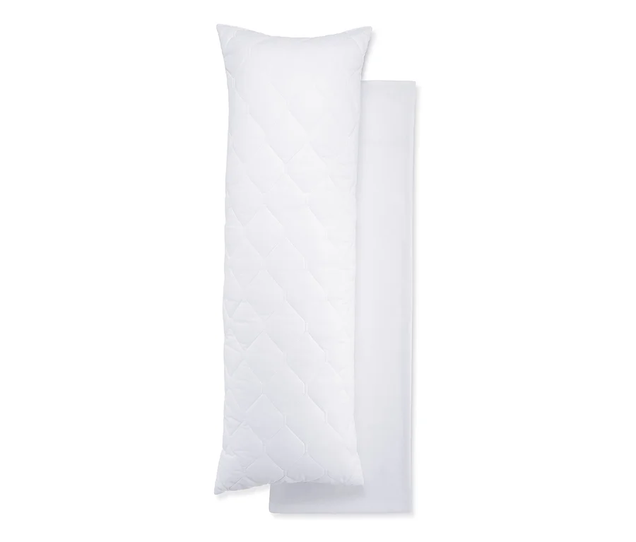 Deux coussins blancs pour dormir sur le côté, dont un matelassé.