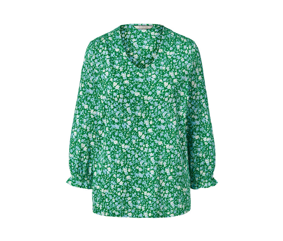 Blouse verte à manches 3/4 avec un imprimé floral.