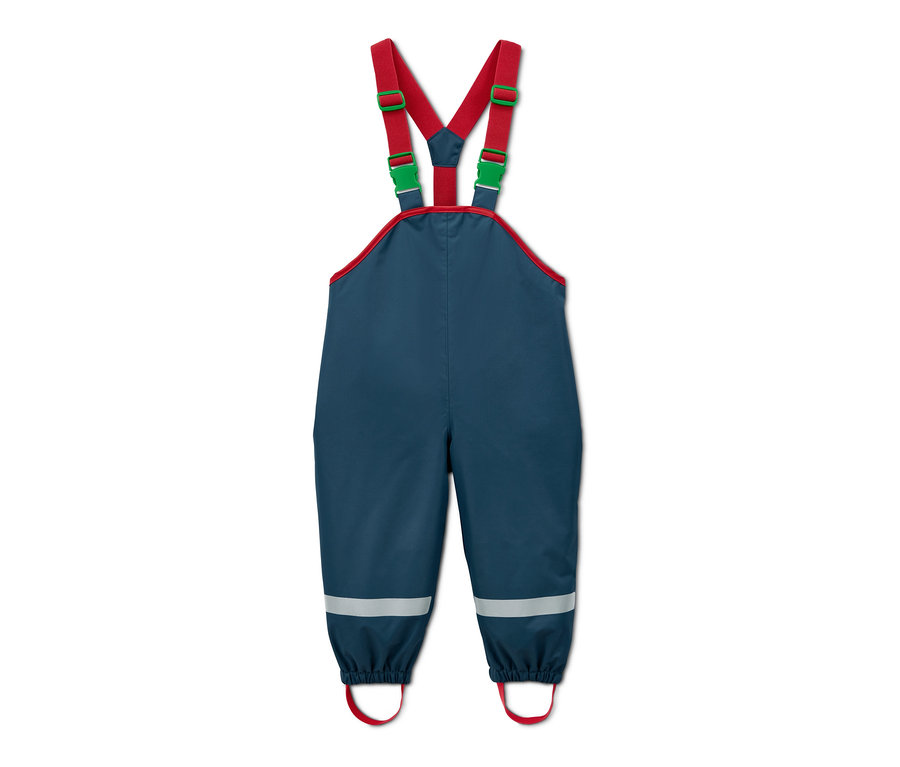 Pantalon de pluie bleu en matériaux recyclés avec bordures rouges et bretelles rouge et vert.