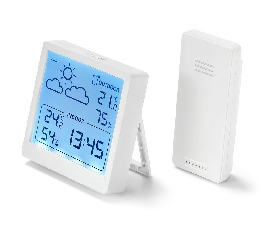 Deux stations météo blanches affichent la température et l'humidité.