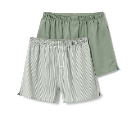 Deux caleçons tissés, un uni vert et un rayé vert.
