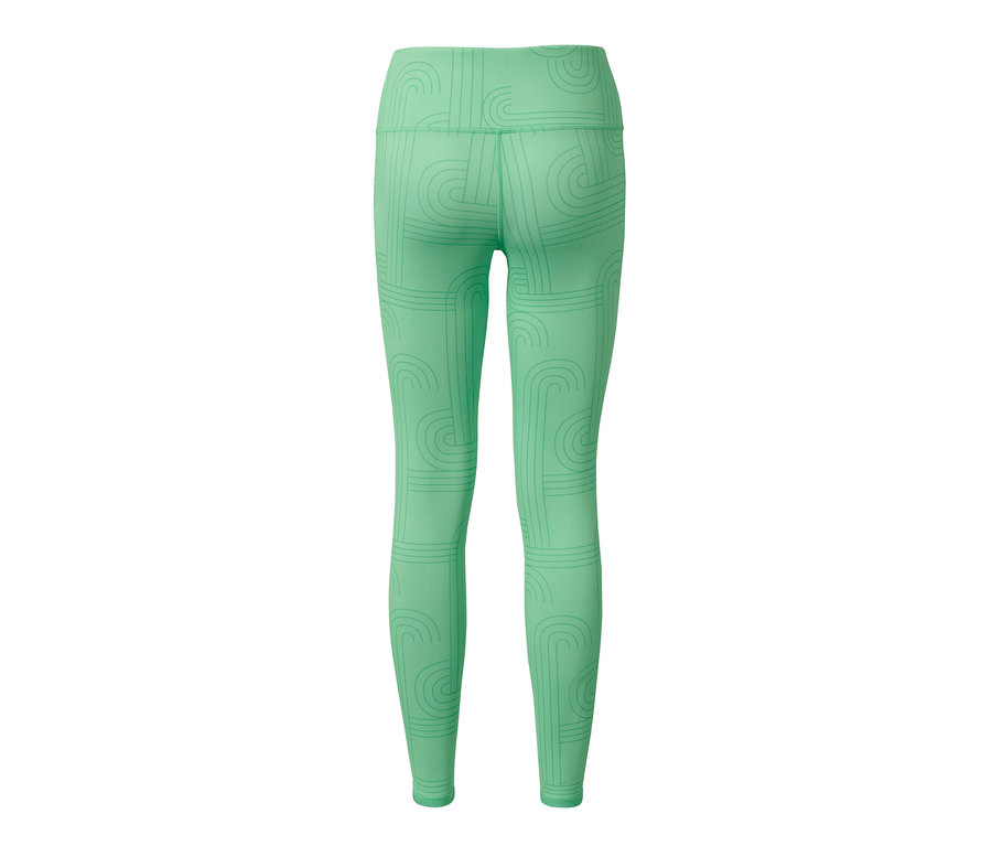 Vue arrière d'un legging de sport réversible vert avec un motif géométrique.