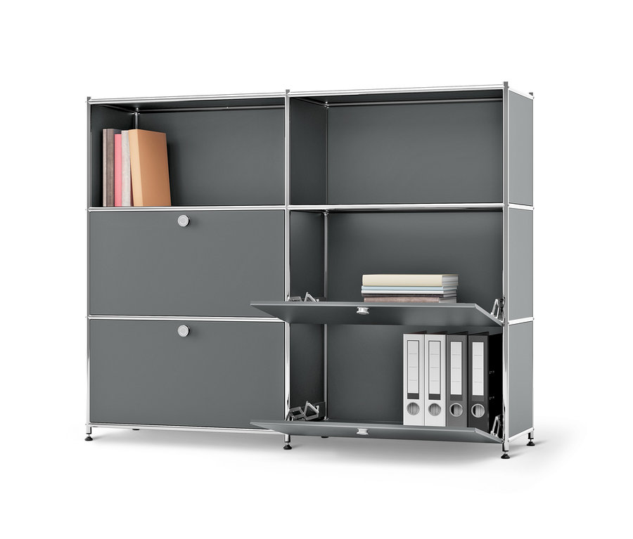 Commode en métal grise « CN3 » à abattants amovibles, avec des livres et des classeurs.