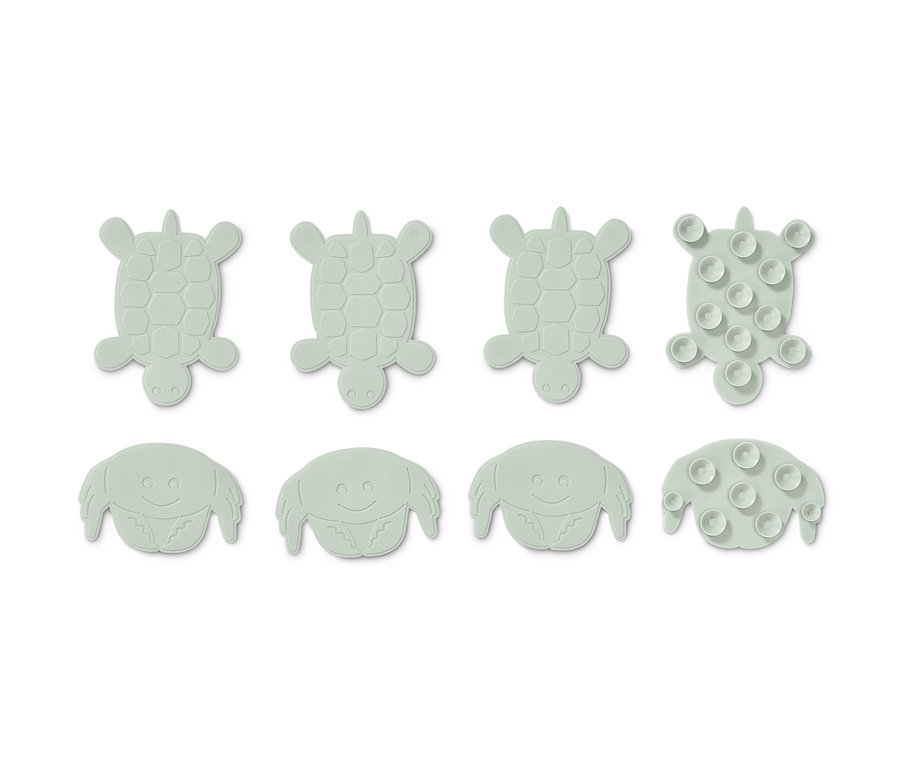 Huit pads anti-glisse en forme de tortues et de crabes.