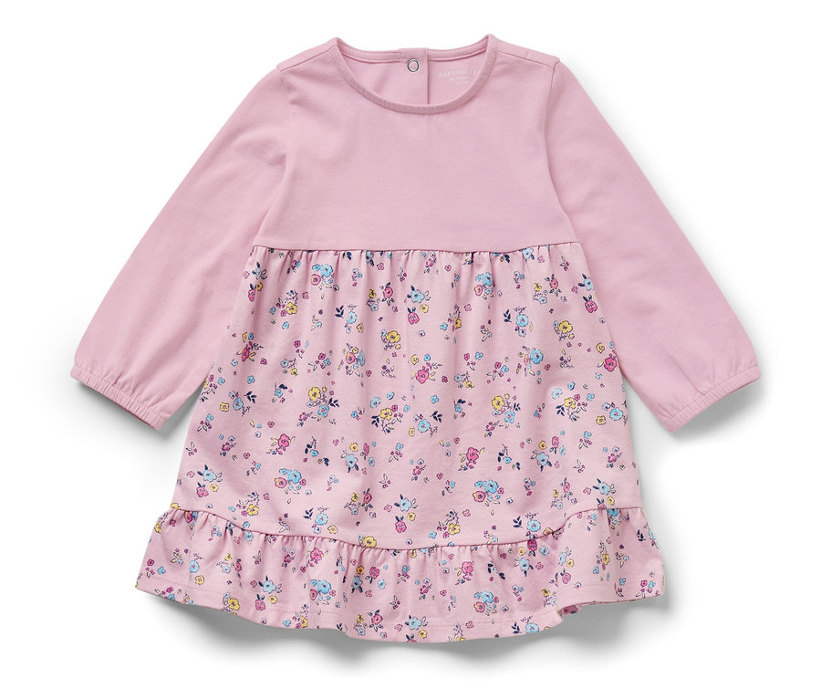 Robe en jersey rose pour bébé avec motif floral.