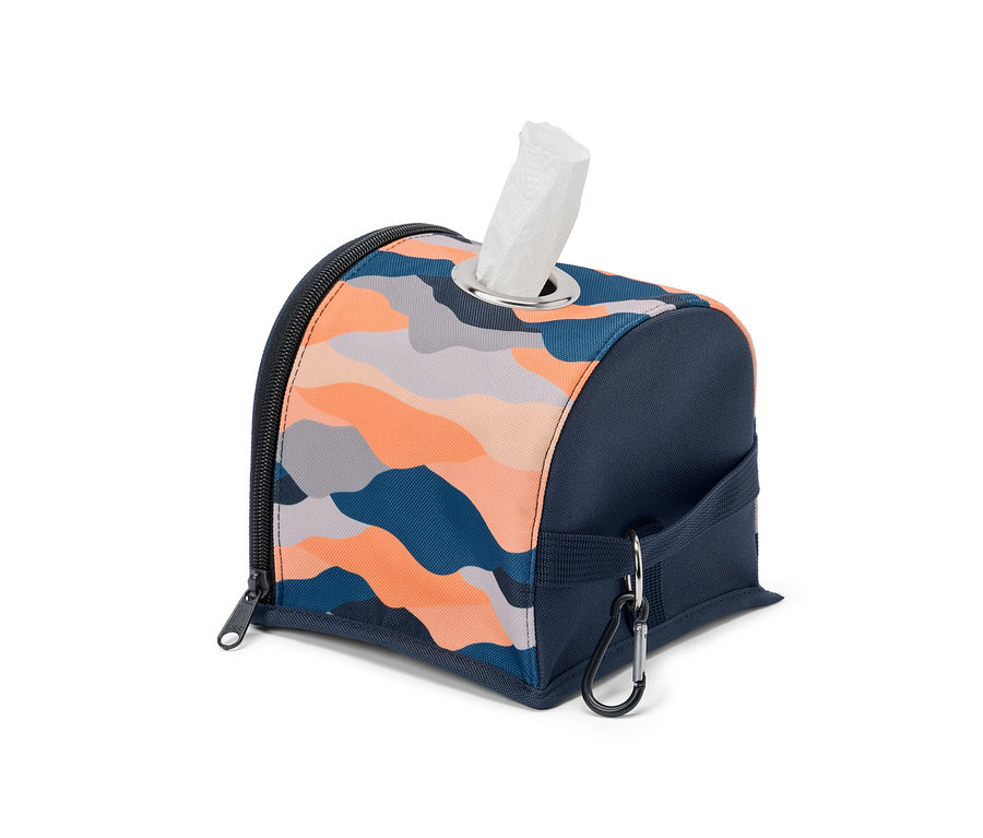 Distributeur de papier toilette à motifs orange et bleu.