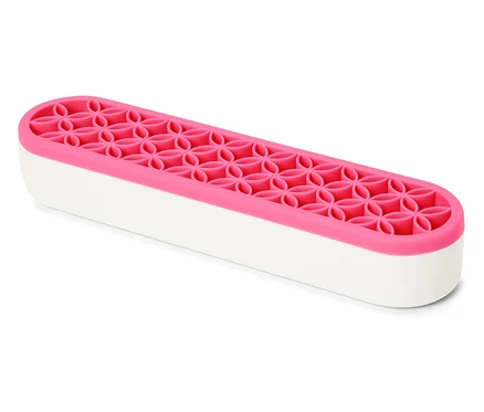 Un organiseur polyvalent blanc et rose.