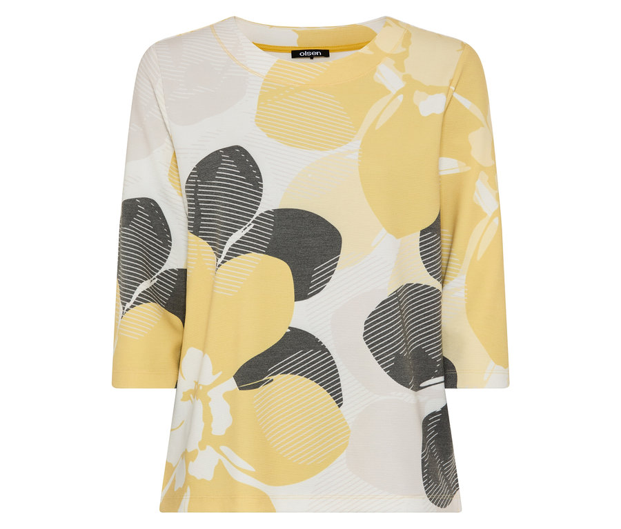 Une chemise à manches longues avec des motifs floraux jaunes et gris.