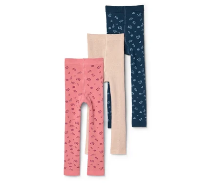 Trois leggings pour enfants, rose à motifs, beige et bleu marine à motifs, sont superposés.