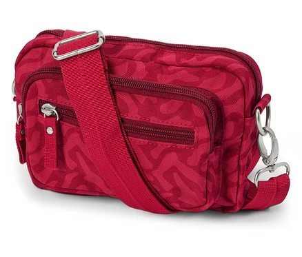 Sac de sécurité à bandoulière rouge avec fermetures éclair et sangle réglable posé sur un fond blanc.