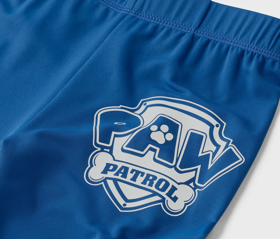 Gros plan sur un legging bleu avec le logo Paw Patrol.