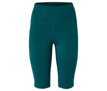 Gros plan sur un legging turquoise taille haute avec une poche latérale.