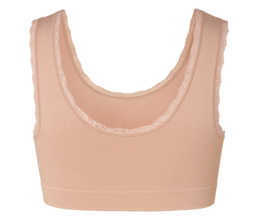 Gros plan d'un soutien-gorge de sport beige avec des finitions en dentelle.