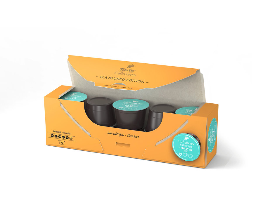 Emballage ouvert orange de Cafissimo Flavoured Espresso Toasted Nut avec 10 capsules, les capsules étant visibles à l'intérieur.