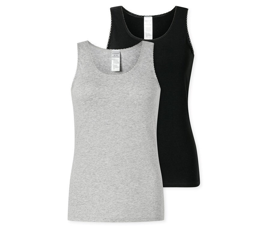 Deux tops SCHIESSER, un gris et un noir, sont superposés. Ils ont tous les deux de fines bretelles et une bordure en dentelle.