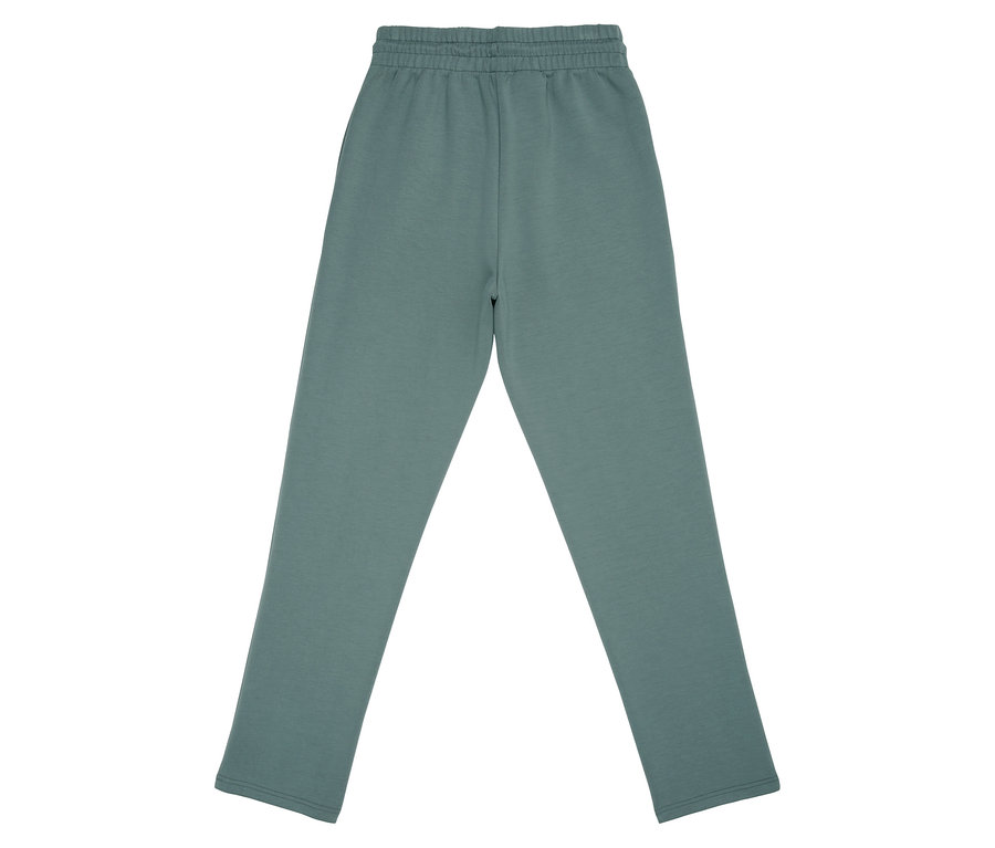 Un pantalon palazzo pour femme FILA en mélange modal est posé sur un fond blanc.