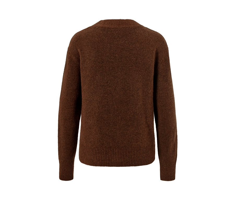 Vue détaillée de l'arrière d'une veste en maille avec de la laine.