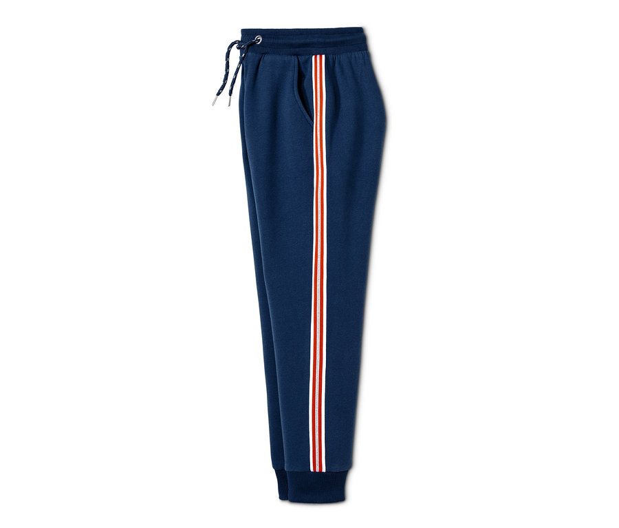 Pantalon molletonné bleu avec une bande rouge et blanche sur le côté.