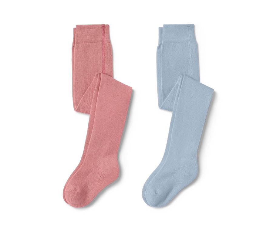 Deux collants pour enfants, un rose et un bleu clair.