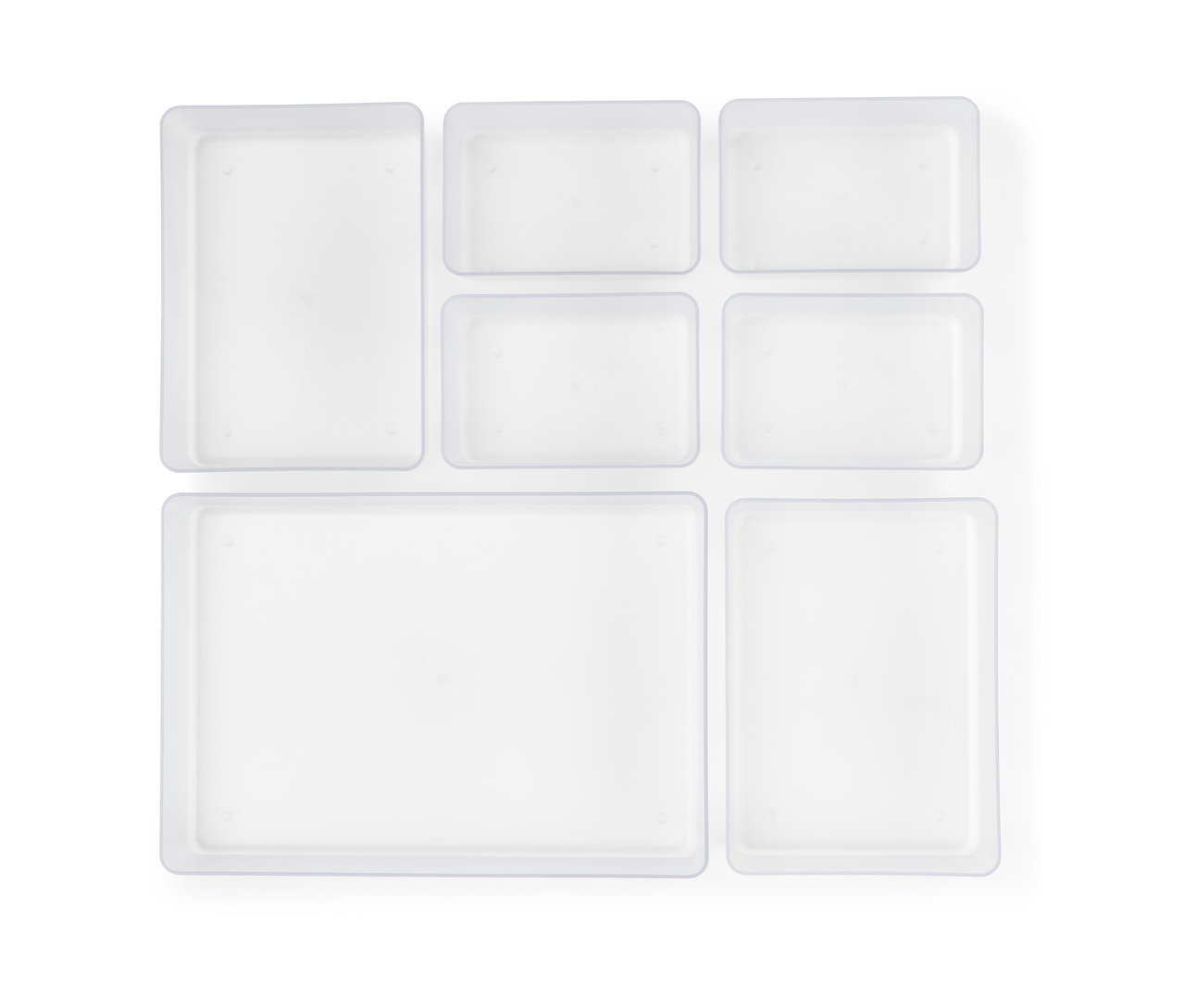 Vue de dessus d'un ensemble d'organisateurs de tiroir transparents.