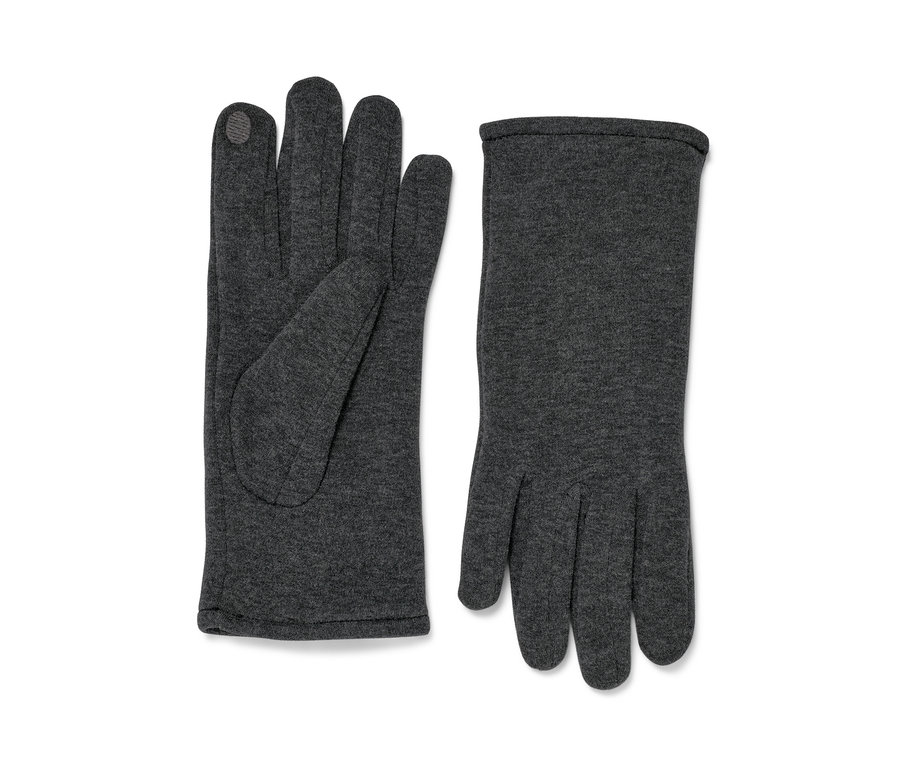 Deux gants en sweat sont placés côte à côte.