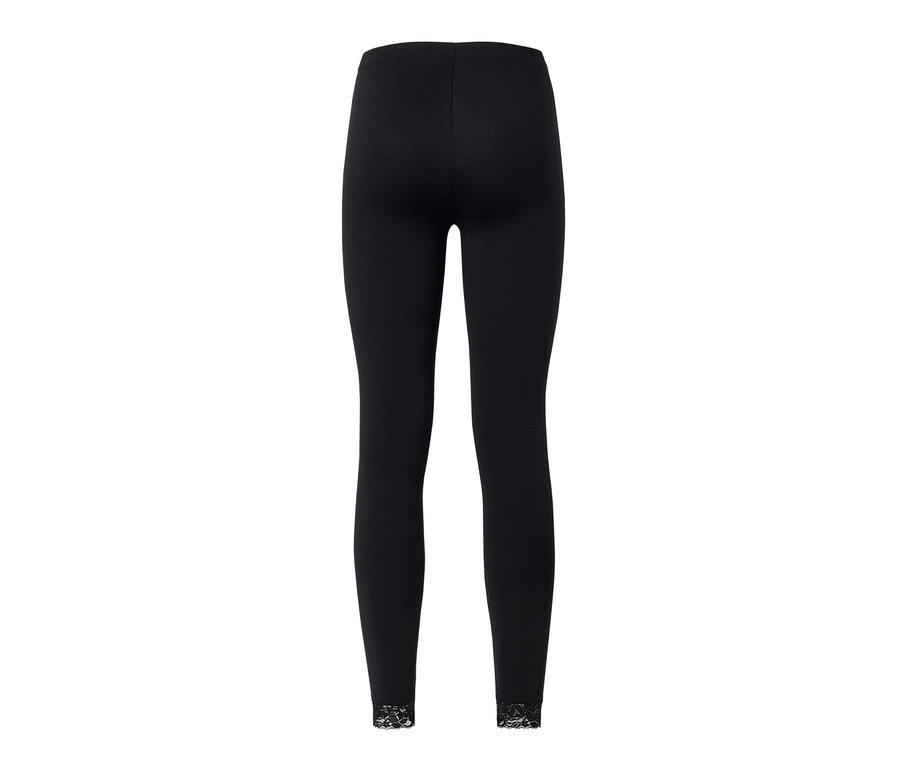 Legging noir avec bordure en dentelle.
